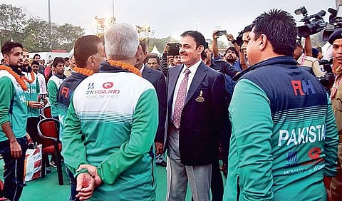 Players and officials of Pakistan Hockey team interact with DGP Dr RP Sharma in the fan village at Kalinga Stadium | Express