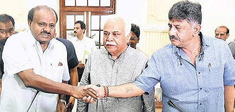 Chief Minister H D Kumaraswamy greets Revenue Minister R V Deshpande and Water Resources Minister D K Shivakumar in Bengaluru on Tuesday | Nagaraja Gadekal