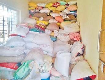 Rice bags stored in a room at the Junior College campus in Madikeri