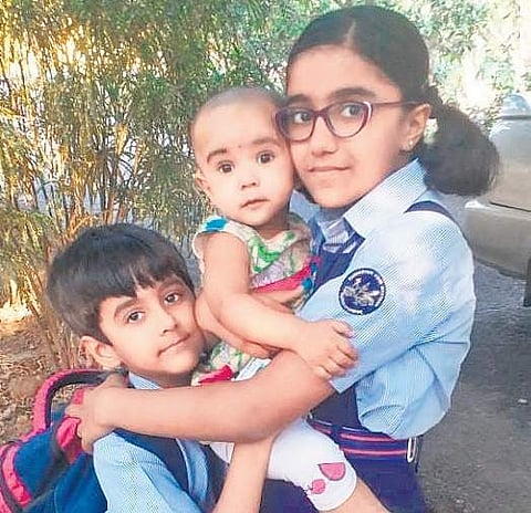 Selselmiya, 2, Danfalis, 10, who died in the fire. Their sister Selsfiya was rescued