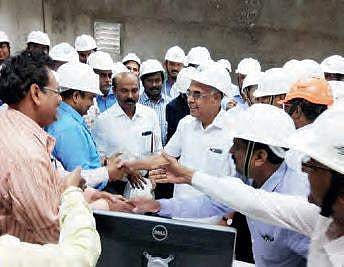 Staff celebrate after the boiler of Kothagudem Thermal Power Station was lighted | Express
