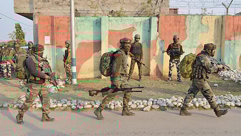 Security personnel take positions during a militants attack at Sunjwan Army camp in Jammu. (PTI)