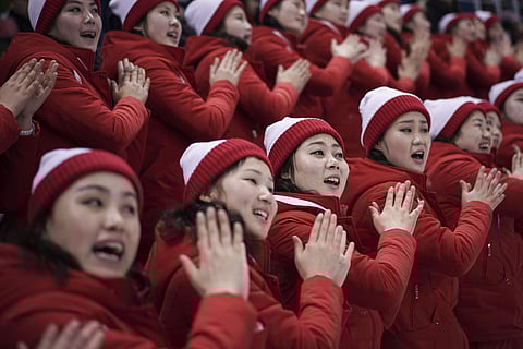 North Korean supporters cheer during the preliminary round of the women's hockey game between Switzerland and the combined Koreas at the 2018 Winter Olympics in Gangneung, South Korea, Saturday, Feb. 10, 2018.  | AP