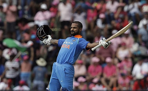 India's batsman Shikhar Dhawan celebrates his century during the fourth One-Day International cricket match between South Africa and India at the Wanderers stadium in Johannesburg. (AP)