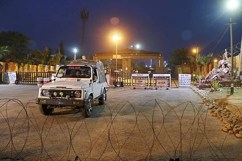 A polce vehicle at Sunjuwan Military Station during the 2nd day of the terrorist attack in Jammu on Sunday. (PTI)