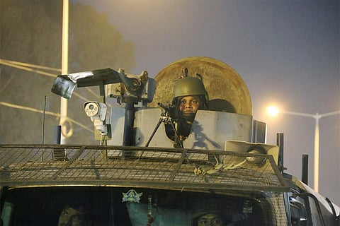 A security person guards at Sunjuwan Military Station during the terrorist attack in Jammu on Sunday. (PTI)