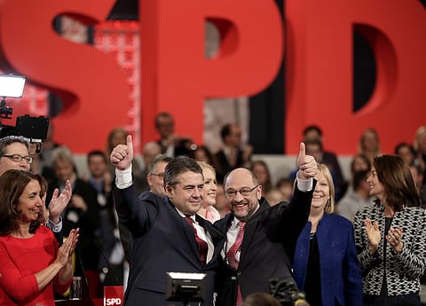 Outgoing chairman Sigmar Gabriel(CL) and then designated chairman and top candidate for the upcoming general election Martin Schulz of the German SPD (File | AP)