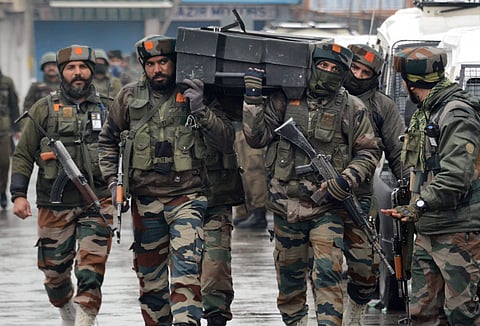 Two Lashkar-e-Taiba (LeT) militants are holed up inside an under-construction building in Karan Nagar area since Monday after their failed terror bid on a CRPF camp. | PTI