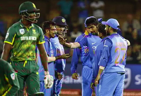 Indian cricketers celebrate a wicket during the fourth ODI cricket match between South Africa and India in Port Elizabeth, South Africa, Tuesday, Feb. 13, 2018. | AP