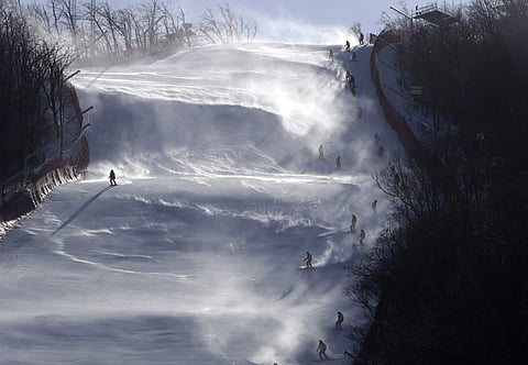 Thirteen staff and three spectators were slightly injured as signs, tents and equipment were blown around. (Photo | AP)