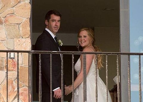 Amy Schumer secretly weds beau Chris Fischer