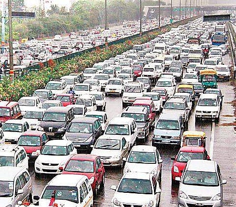 Government bats for oil-guzzling car industry with 'no explicit policy for eletric vehicles' stance