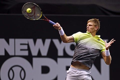 Kevin Anderson, of South Africa, returns a shot to Kei Nishikori, of Japan, during their semifinals match at the New York Open tennis tournament. (AP)