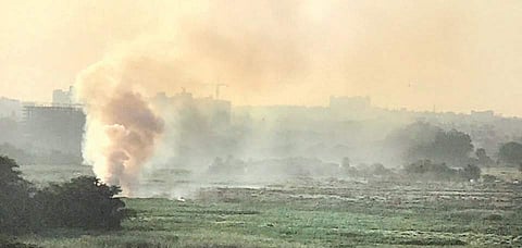 Yellowish-white smoke seen over the lake on Thursday