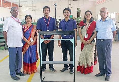 Students and their faculty guides with the device