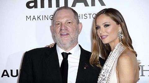 Harvery Weinstein and fashion designer Georgina Chapman in happier times. |AP