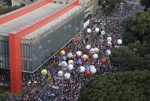 Demonstrators march against pension reform proposed by Brazil's President Michel Temer's government in Sao Paulo, Brazil, Monday, Feb. 19, 2018. | AP