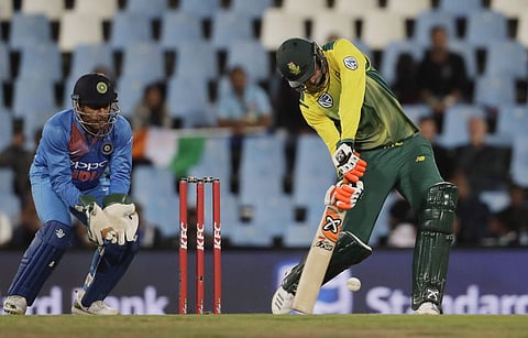 South Africa's batsman Heinrich Klaasen, right, plays a shot as India's wicketkeeper MS Dhoni, watches during the second T20 cricket match between South Africa and India at Centurion Park in Pretoria. | AP
