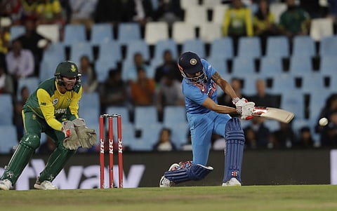 India's batsman Manish Pandey, right, plays a shot as South Africa's wicketkeeper Heinrich Klaasen, watches during the second T20 cricket match between South Africa and India at Centurion Park in Pretoria. | AP