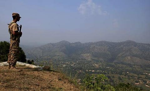 A soldier monitors the Line of Control (LOC) in Kashmir. (File Photo)