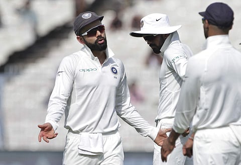 India's captain Virat Kohli reacts during the third day of their first test cricket match against Sri Lanka in Kolkata. | AP File Photo
