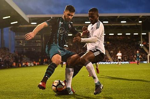 Southampton's Irish striker Shane Long (L) vies with Fulham's English defender Ryan Sessegnon during the English FA Cup. | AFP