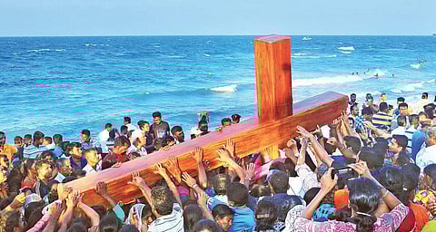 Devotees carrying the cross during the St Anthony’s Church festival in Katchatheevu on Saturday | Ponmalar