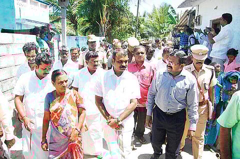 NCSC Vice Chairman L Murugan, Collector Dr L Subramanian and Villupuram SP  S Jayakumar and visiting Vellamputhur village on Monday | Express