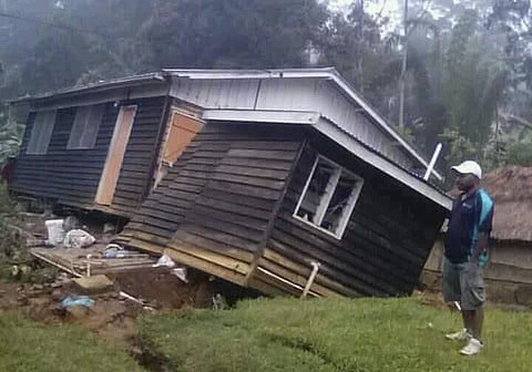 An earthquake survivor outside his collapsed house in Hela Province of PNG (File | AP)