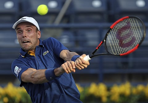 Roberto Bautista Agut had to save four break points to serve out the first set. | AP