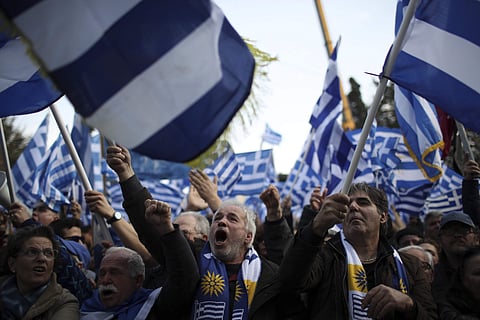 As a huge Greek flag flew over central Syntagma Square from atop a crane, Greeks from all over the country and abroad chanted 'Hands off Macedonia', 'Macedonia is Greek' and 'We won't leave until we are vindicated'. (Photo | AP)