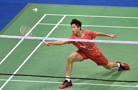 Chinese badminton player Shi Yuqi plays against Taiwan badminton player Chou Tien Chen during the men's singles final badminton match at the Yonex-Sunrise India Open 2018 in New Delhi on Sunday. | PTI
