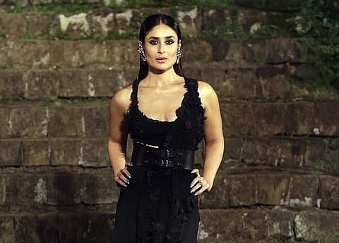 Bollywood actress Kareena Kapoor displays a creation by Anamika Khanna at the grand finale during Lakme Fashion Week in Mumbai, India, Sunday, Feb. 4, 2018 . (AP Photo)