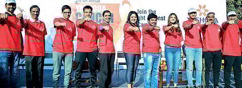 Cancer can be cured, prevented say marathon runners