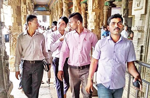 A team of sleuths from NSG inspecting the Meenakshi Amman Temple in Madurai on Tuesday | Express