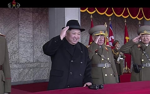 In this image made from video by North Korea's KRT, North Korean leader Kim Jong Un, center, attends a military parade in Pyongyang | AP