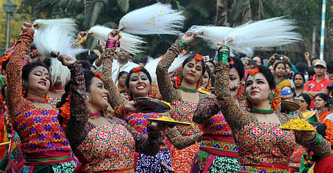Revellers across India celebrate the festival of colours with fervour to honor the triumph of good over evil. On the eve of Holi,  people play with colors, water guns and indulge themselves in festivities. IN PICTURE: Students perform on the occasion of '