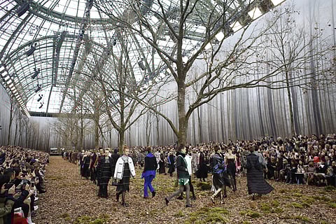 Models wear creations for the Chanel ready-to-wear fall/winter 2018/2019 fashion collection presented in Paris, Tuesday March 6, 2018. | AP