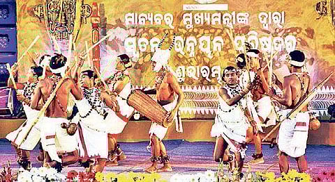 Tribals performing a group dance during the launch of Special Development Council in Bhubaneswar on Friday | EPS