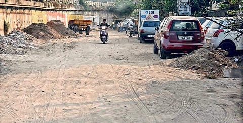The incomplete road work troubles residents of Pakeer Gudem; (Below) poor drainage system adds to citizen’s woes | P Ravindra Babu