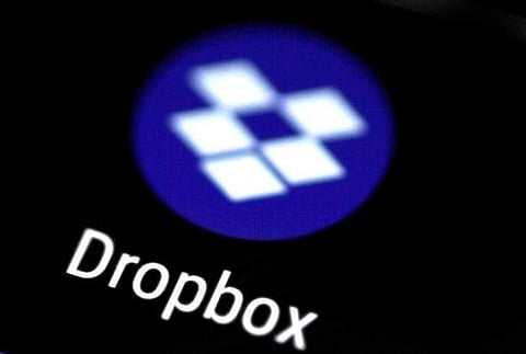 The Dropbox app logo seen on a mobile phone in this illustration photo | REUTERS