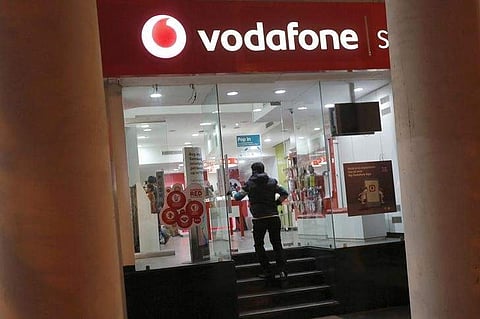 A customer enters a Vodafone store in New Delhi. | Reuters File Photo