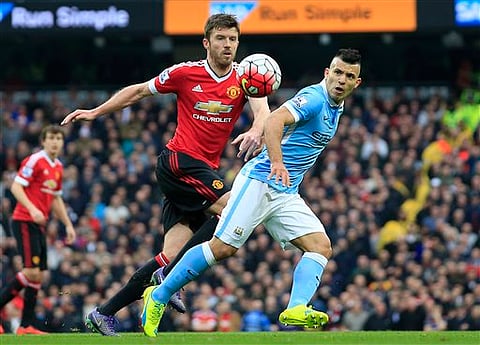United’s Michael Carrick (left) |AP