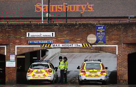Police close the entrance to the car park of a supermarket after finding an abandoned car near to where former Russian double agent Sergei Skripal and his companion were found critically ill following exposure to a nerve agent substance. (File | AP)