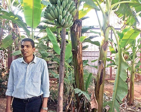 Joshy K J in his garden