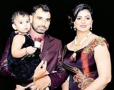 Mohammed Shami is seen with his wife Hasin Jahan and daughter Aairah (File | EPS)