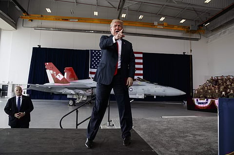 President Donald Trump gestures after speaking to service members at Miramar Air Corps Air Station, Tuesday, March 13, 2018, in San Diego. | AP
