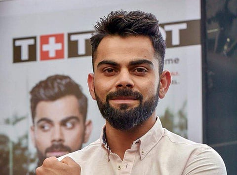 Indian skipper Virat Kohli poses for a photograph during a promotional event in Mumbai. | PTI