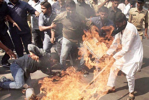 Youth Congress members burn the effigy of Telangana CM  K Chandrasekhar Rao at Gandhi Bhavan protesting against expulsion of MLAs from Assembly on Tuesday | Vinay Madapu