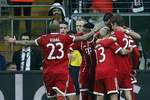 Bayern's players celebrate the third goal of their team during the Champions League, round of 16, second leg, soccer match between Besiktas and Bayern Munich at Vodafone Arena stadium in Istanbul, Wednesday, March 14, 2018. | AP
